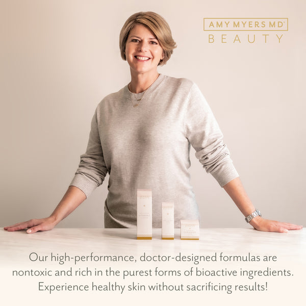 Picture of Dr. Amy Myers smiling behind the travel size beauty products displayed on a white granite countertop. With text on the bottom that reads, Our high-performance, doctor designed formulas are nontoxic and rich in the purest forms of bioactive ingredients. Experience healthy skin without sacrificing results!
