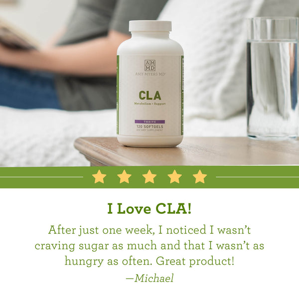 A bottle of CLA Metabolism Support on a nightstand with reviews - Reviews Image - Amy Myers MD®